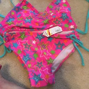 Various bathing suits.  Most are size 10-12